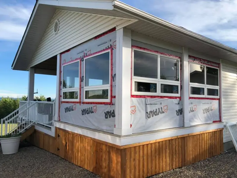 Completed addition with finished siding